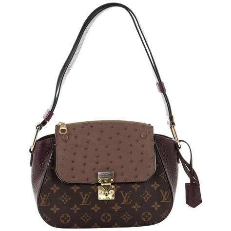 louis vuitton shoulder bag with coin purse|Louis Vuitton majestueux shoulder bag.